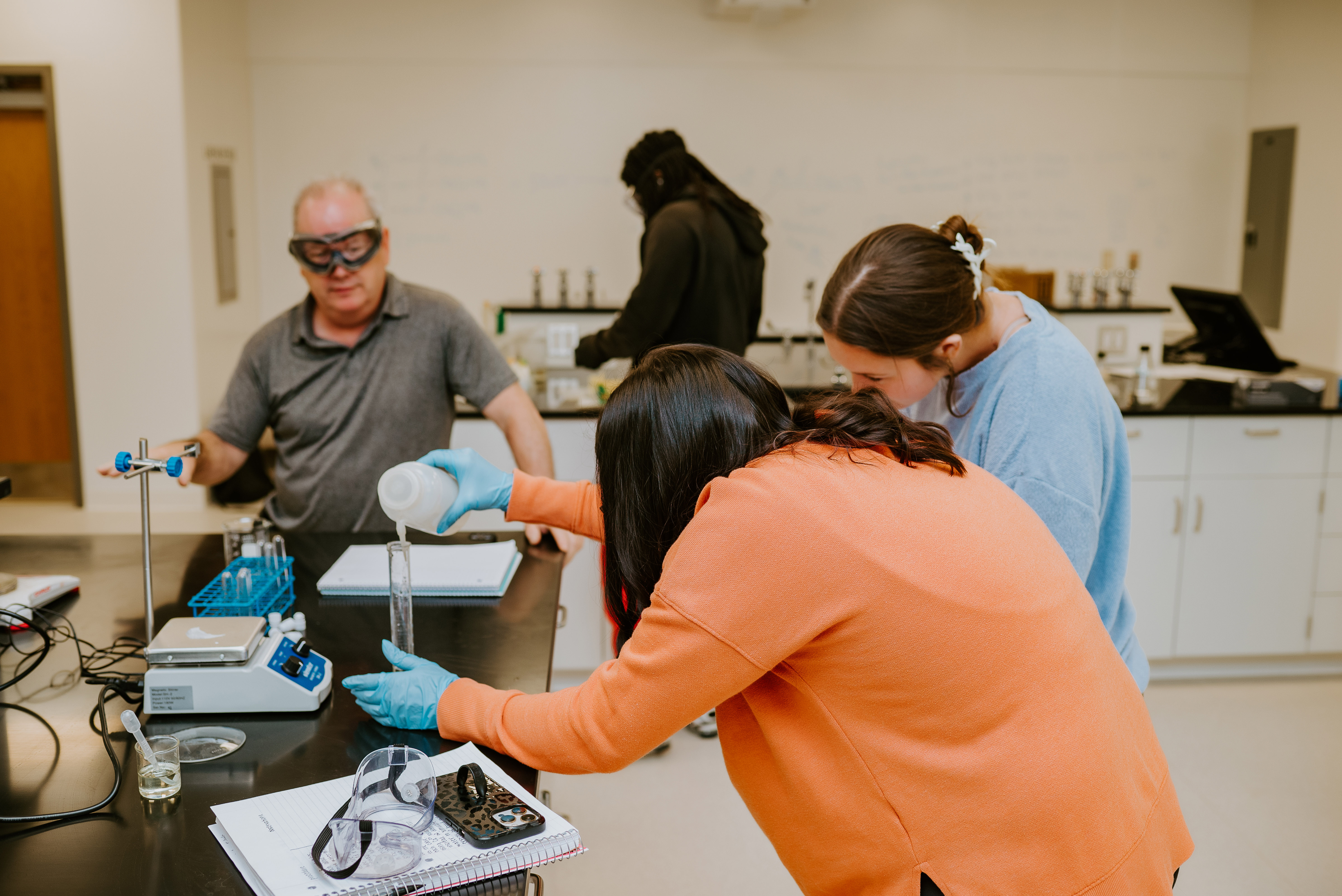 Students performing science lab