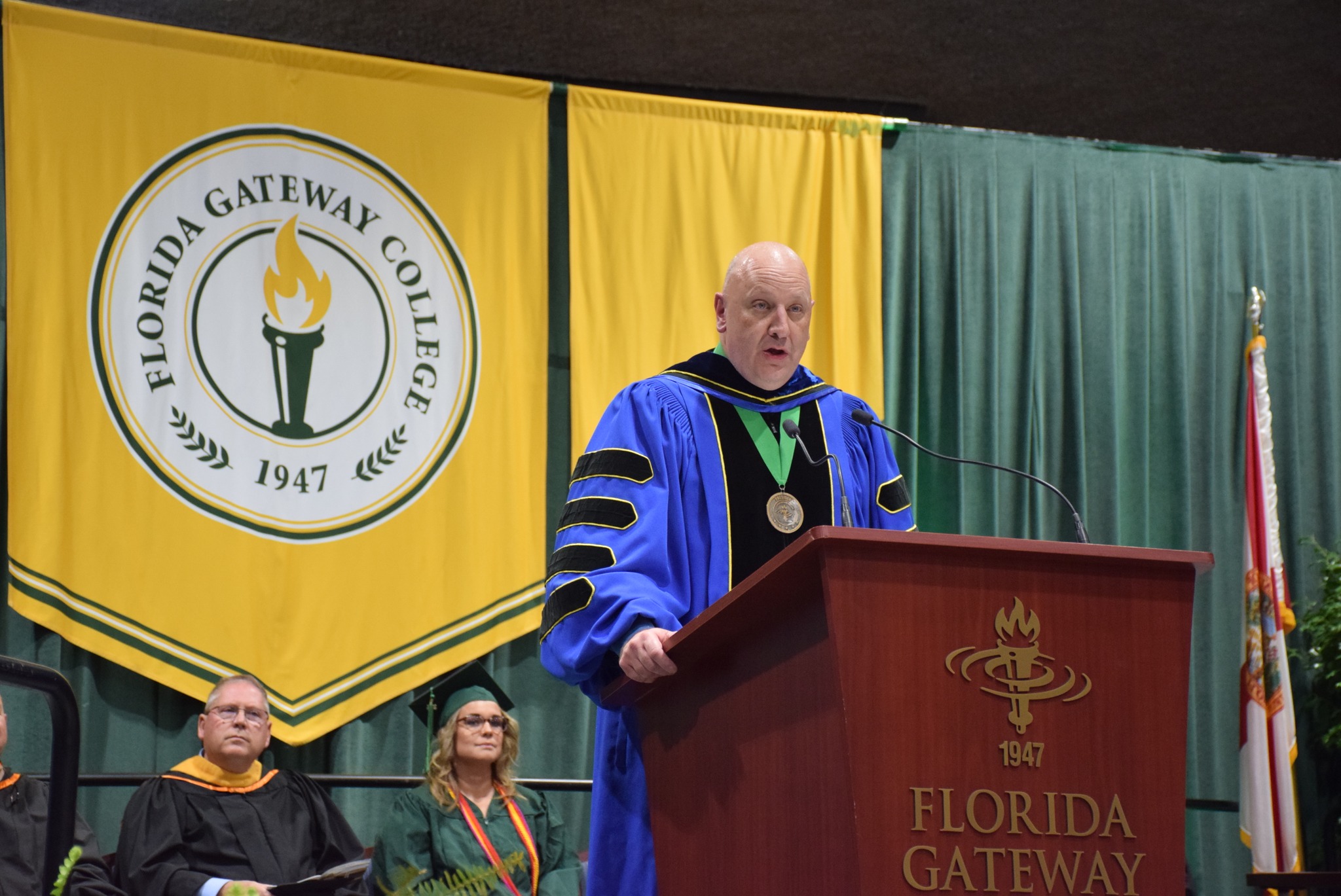 FGC President Dr. Lawrence Barrett speaking at graduation ceremony.
